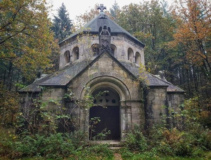 overgrown mausoleum